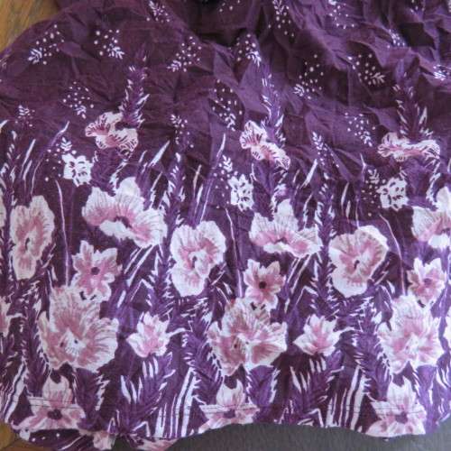 Trendsetting creased mulberry colour loose dress. By `Woolworths`. Size 44/20. Good condition.