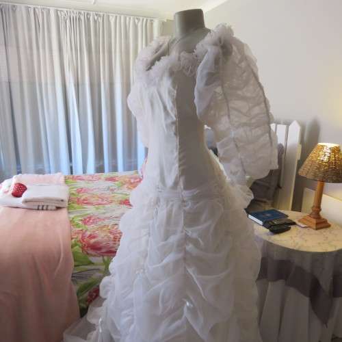 Feminine fairytale wedding dress. By well known boutique. Size 36/12. New condition.