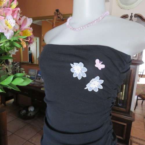 Little black dress with frilled bottom and ruched strapless top. Size 34/10 By `Jin Taiyang`. As new