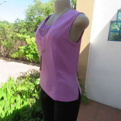 Day to evening wear violet colour sleeveless top. Size 36. New condition.
