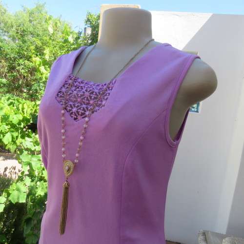 Day to evening wear violet colour sleeveless top. Size 36. New condition.