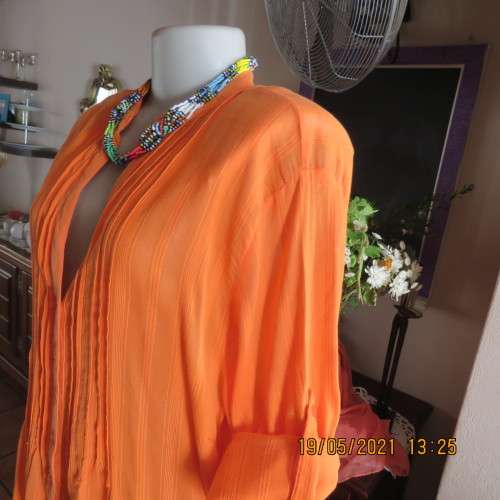 Eyecatching tangerine 100% cotton button down top with tucked decoration.By DONATELLA size 46/22