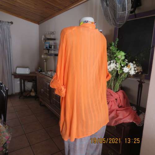 Eyecatching tangerine 100% cotton button down top with tucked decoration.By DONATELLA size 46/22