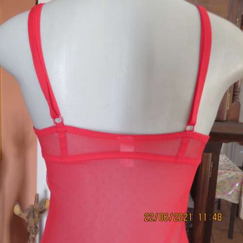 Ultra sexy lingerie. Red size 32 padded bra with adjustable straps and see-through petticoat.As new