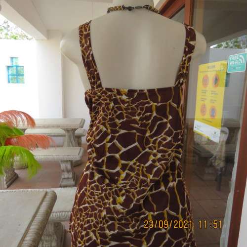 Sexy animal print strappy top by FASHION EXPRESS size 40/16. In 100% fully lined polyester. As new.