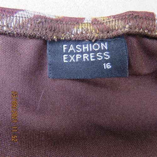 Sexy animal print strappy top by FASHION EXPRESS size 40/16. In 100% fully lined polyester. As new.