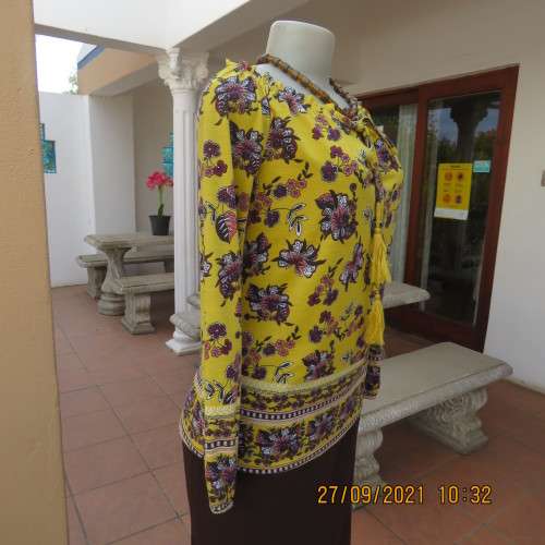 Feminine mustard yellow off the shoulder long sleeve top with crimson.maroon flowers.Size 32 to 34.