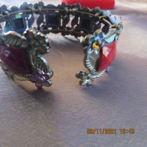 Colouful fit all sizes bangle with square stones on copper base. Tiny flowers. As new.
