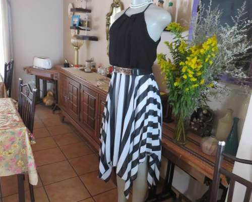 Enchanting monochrome dress from a special evening out.Size 34/10 by Inwear. High/Low seam.New cond.