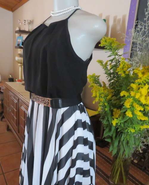 Enchanting monochrome dress from a special evening out.Size 34/10 by Inwear. High/Low seam.New cond.