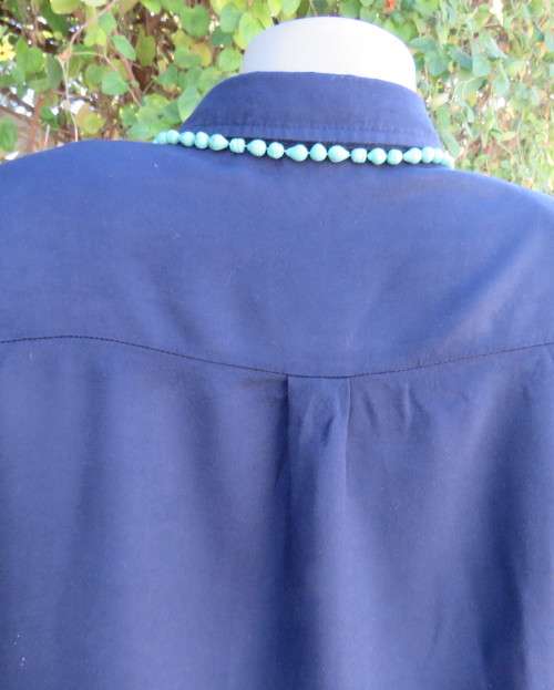Soft warm 100% viscose long sleeve top in navy with hidden button down front. By CONTEMPO size 40/16