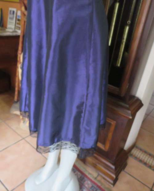 Sexy boutique made eggplant purple satin halter neck dress with black lace decor. Size 34/10.