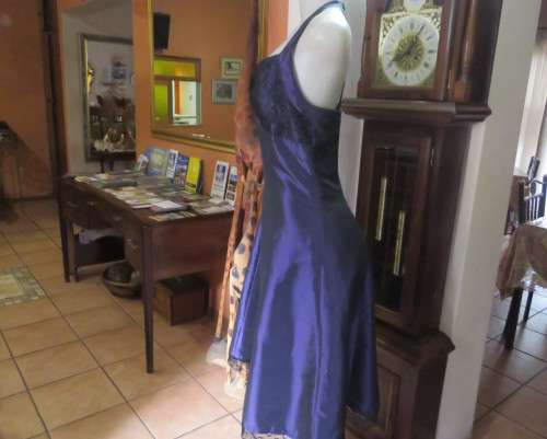Sexy boutique made eggplant purple satin halter neck dress with black lace decor. Size 34/10.