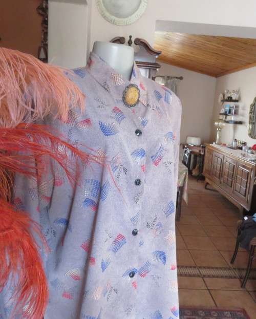 As new REFLEX USA long sleeve light brown with coral/blue pattern blouse.Silky polyester.Size 42