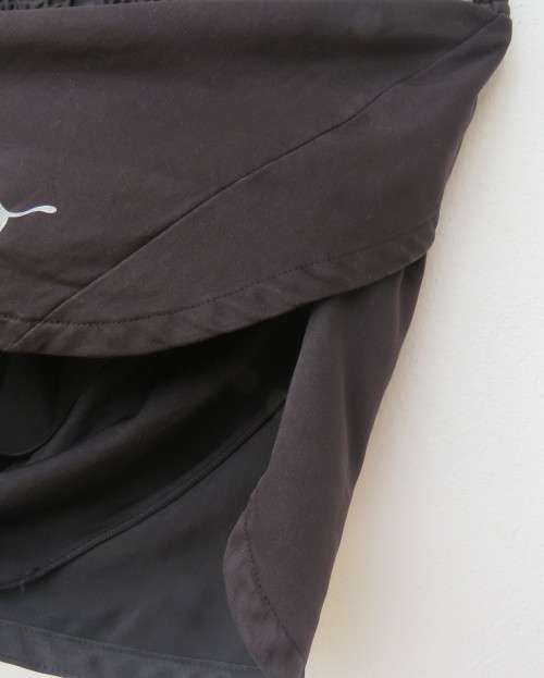 PUMA men`s black sports shorts size Large. In poly/nylon with cool cell. Fold over sides.Good cond.