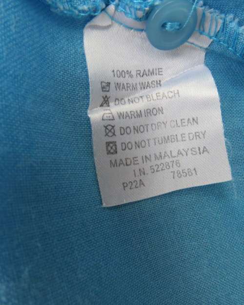 KELSO linen top with button down V front with collar in sky blue size 36/12.Tucked bib on front.