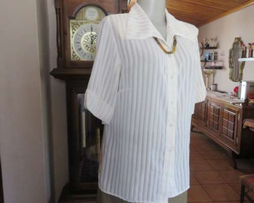 Classic sheer vertical striped polyester short sleeve top.Button down.Open collar.Size 36.Good cond