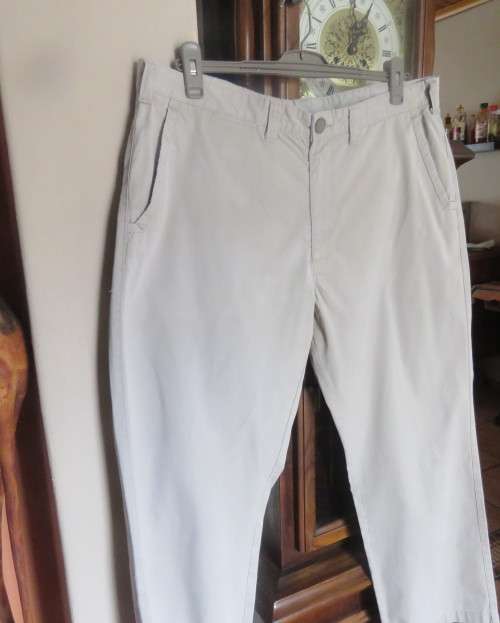 Men`s pure cotton beige straight legged pants by WOOLWORTHS size 40.Pockets sides/back.Good cond.