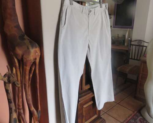 Men`s pure cotton beige straight legged pants by WOOLWORTHS size 40.Pockets sides/back.Good cond.