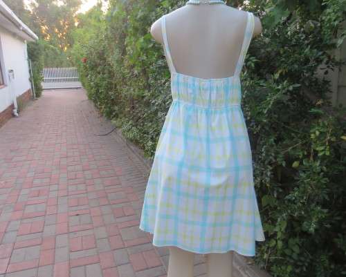 Empire style cool polycotton check dress with elastic waist and back.Shoulder straps,Size 40/16.