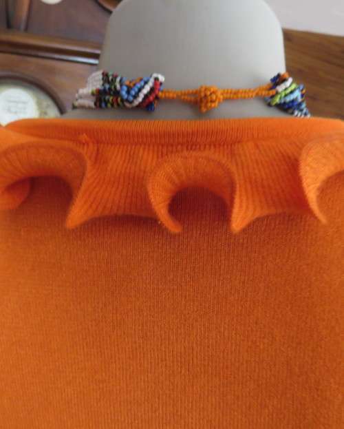 BNE Chic long sleeve stretch polycotton knit cardigan in orange. Size 34.