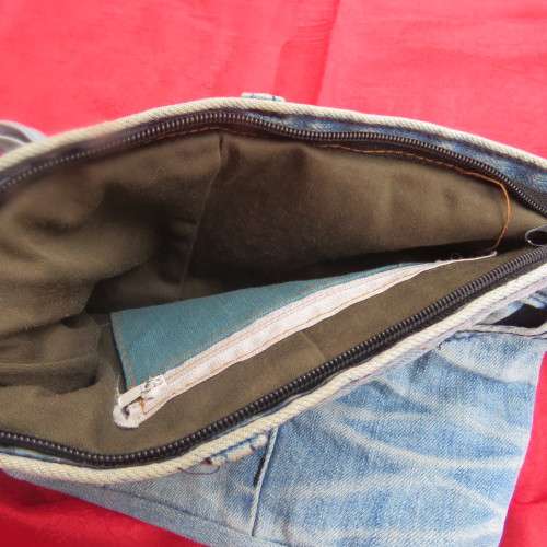 Fashion light blue denim shoulder bag size 28cm x 23cm. Lined with zip-up pocket. Never used.