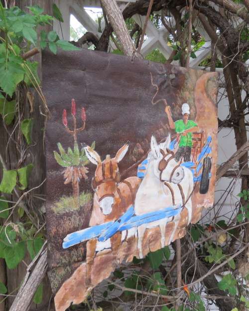 Unique decorative junk art by artist DEON ASSUR 2012 of donkey cart/donkeys on rusted metal.