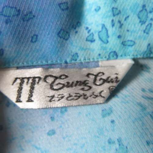 Stunning soft silky button down short sleeve top in medley of blue colours. Size 42/18. By TUNG TAI.