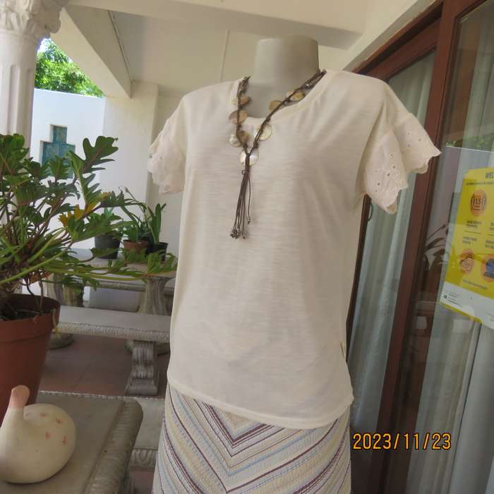 Sweet casual cream slip over polyester stretch top with tiny cut on sleeves/lace.By RED size 36. New