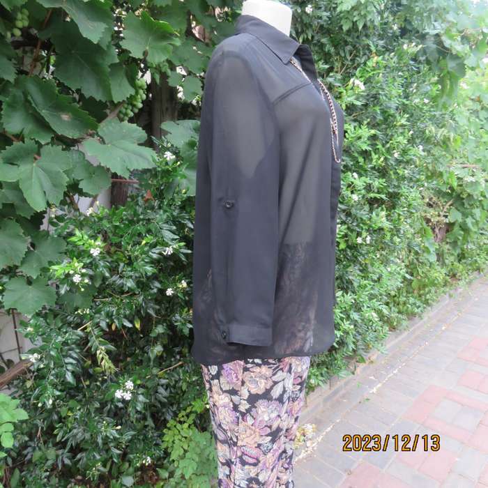 Fabulous sheer black long sleeve top with hidden button down/shirt collar. Size 38 by IMAGE. As new