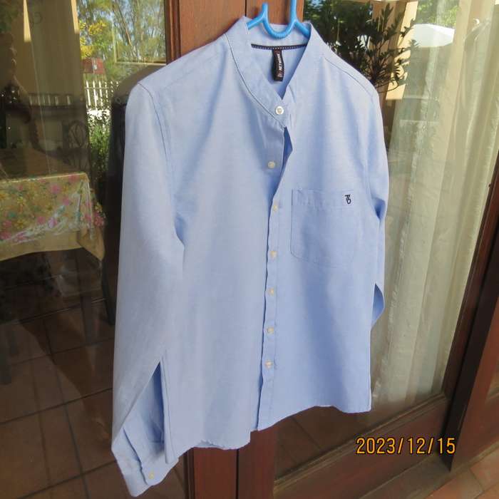 Brand new men`s sky blue long sleeve/high collar polycotton shirt size XS by NETWORK. Chest 84 -89cm