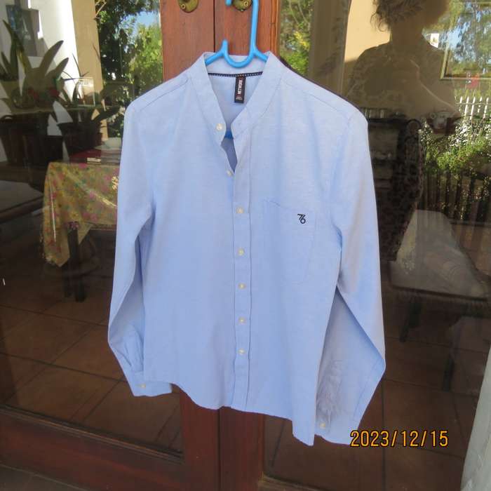 Brand new men`s sky blue long sleeve/high collar polycotton shirt size XS by NETWORK. Chest 84 -89cm