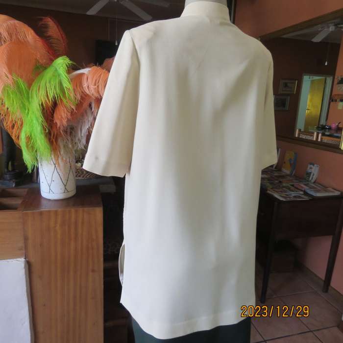 Ultra smart rich cream IBERIS size 38 long top double front. Poly-viscose.High neck. As new