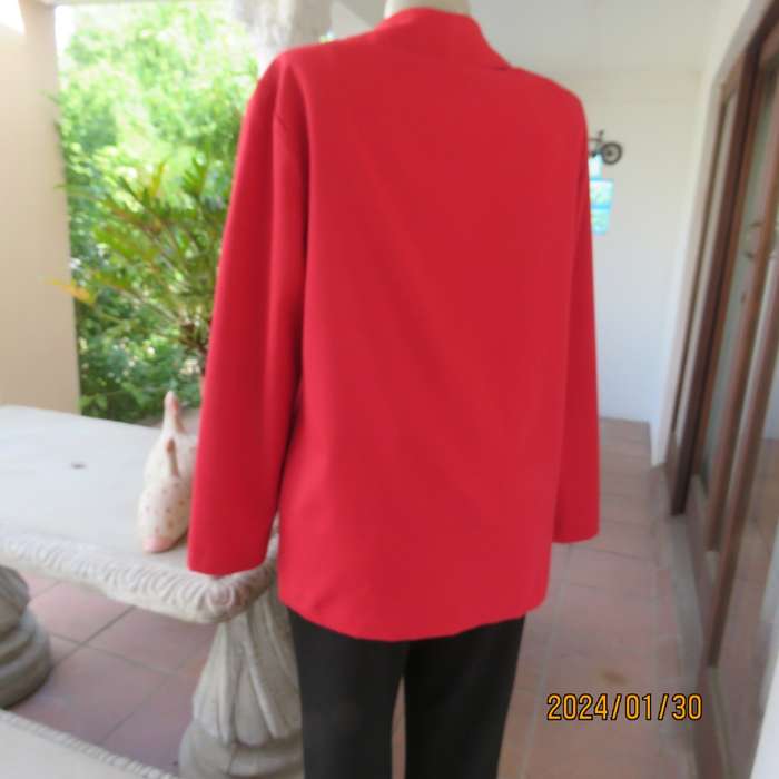 Get noticed in this carmine red long sleeve 3 button jacket with shawl collar.Size 38 to 40. As new