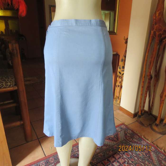 Elegant blue denim colour gored calf length skirt. Size 38. No Label. Side zip. Stretch poly.As new