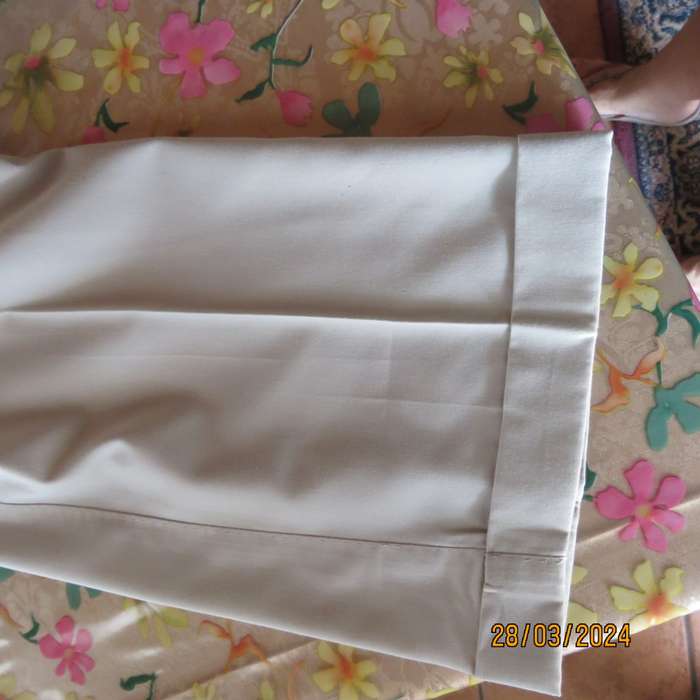 Very smart beige men`s pants with pleated front. Size 30 by ZEE`S Collection. New cond.