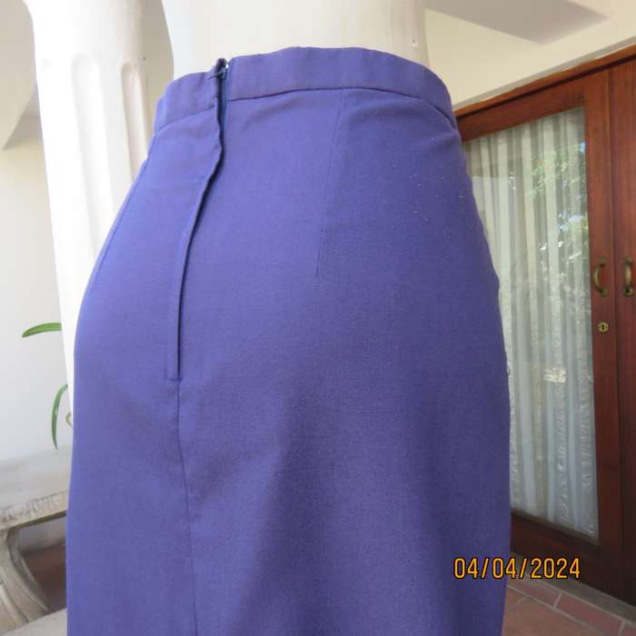 Smart indigo blue 2 pc pencil skirt-open hanging short sleeve jacket. Boutique made size 40.As new