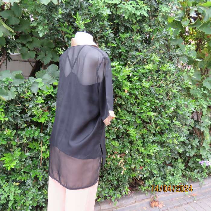 Up the luxe with this sheer black/gold satin button down top/gold shirt collar. Size 42. New cond.