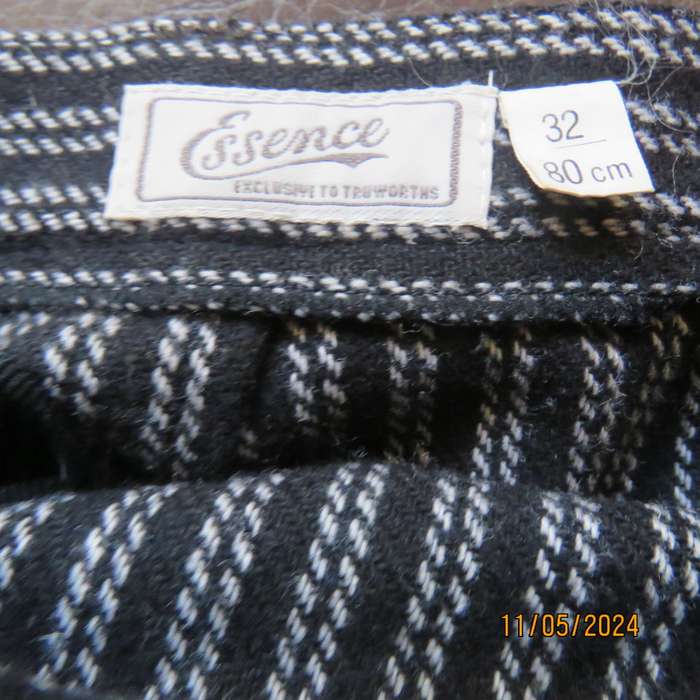 Warm woolen black/white vertical stripe pencil skirt size 30 by ESSENCE. Pleat/zip at back.As new