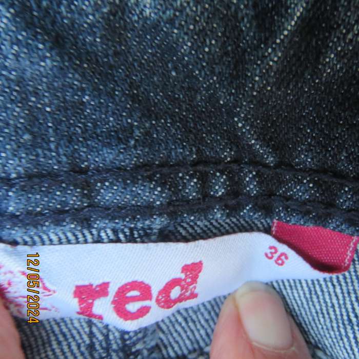Make a statement in this blue denim jean paneled bodycon skirt.Size 36 by RED. As new cond.