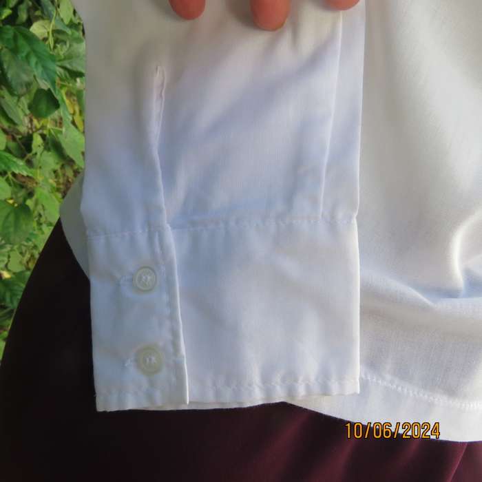 Charming white fine cotton long sleeve top by URB from USA size 35. Braiding closure.Cropped. As new