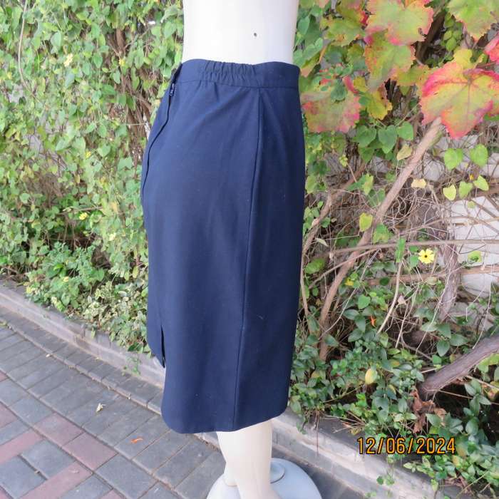 As new dark navy polycotton pencil skirt by BESLIN size 36. Zip and pleat at back.