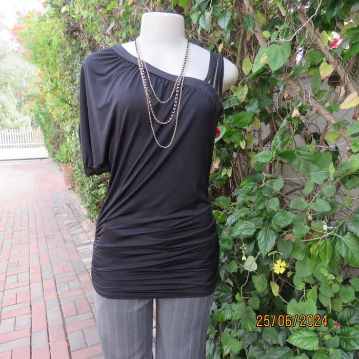 WWW black poly stretch long top. One short cut-on sleeve/and 3 thin shoulder straps.Size 36