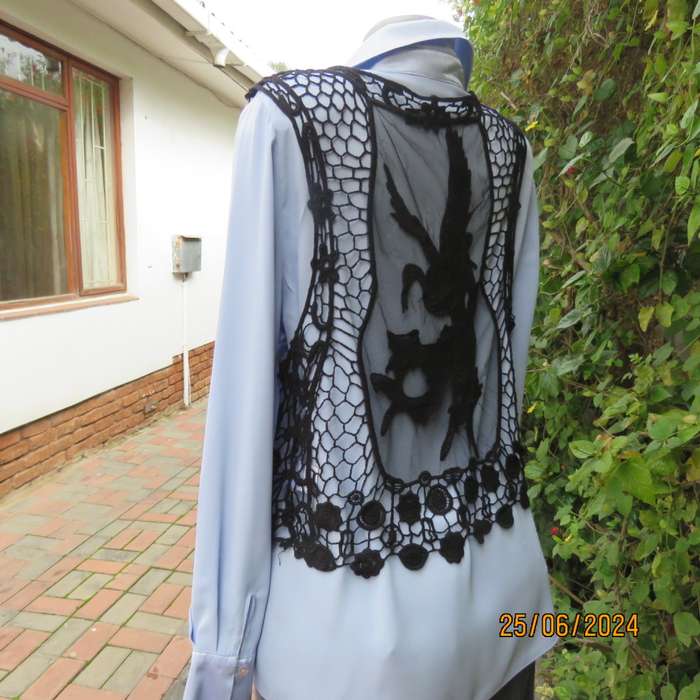 Chic black cotton lace/netting open waistcoat to give oemph to a garment. Size 36/38. New cond.