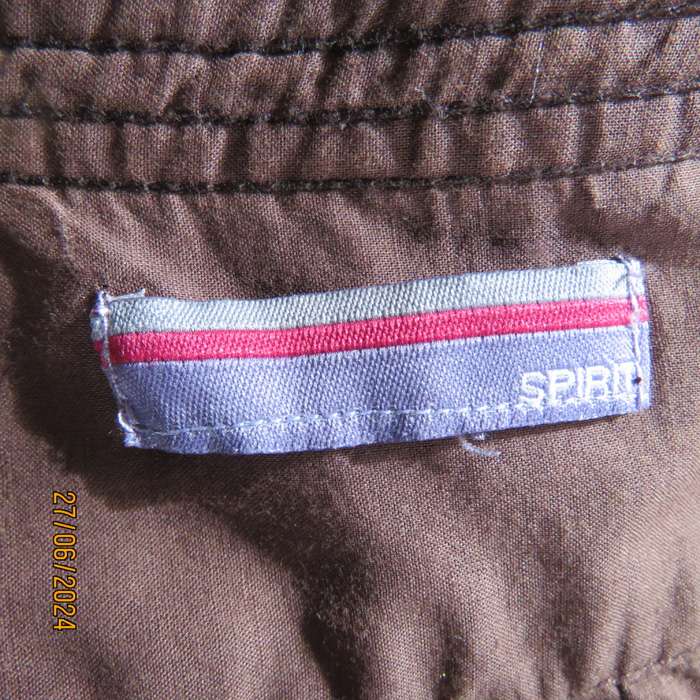 Attractive med brown fold over peplum long sleeve top by SPIRIT from IRELAND. Size 37.Embroidered.