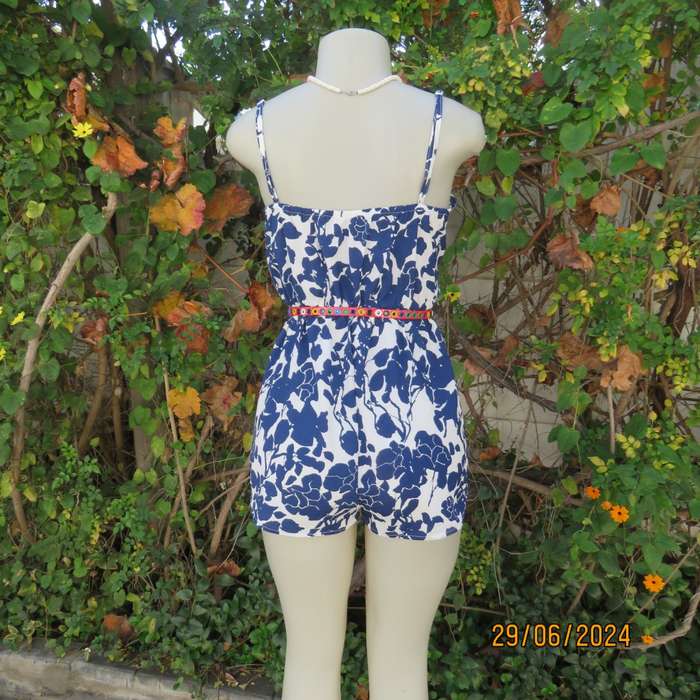 Summer romper in white with bold navy flowers. Elasticated waist. Size 36 by SHEIN. Brand new cond.