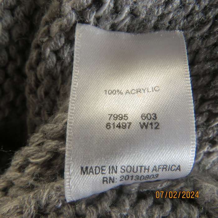 Double knit grey acrylic cardigan. Capped sleeves, button down. Wide fold over collar. Size 36.