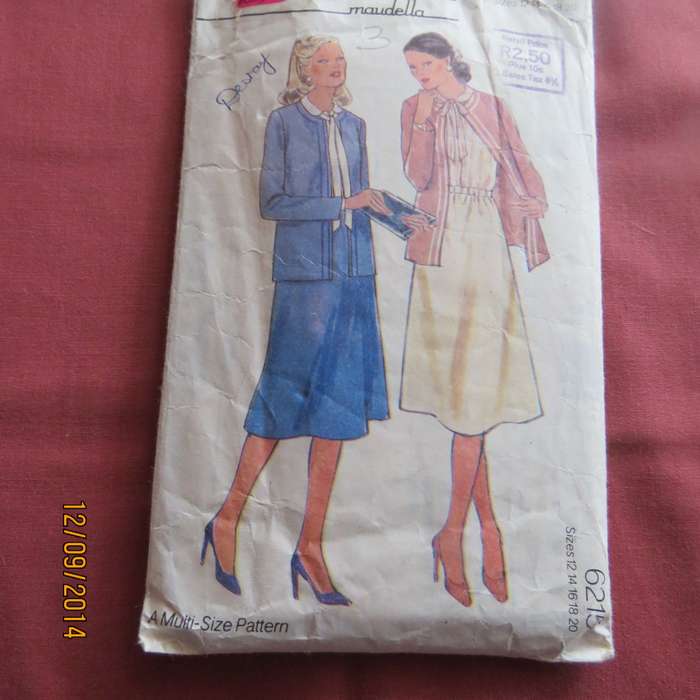 Sewing pattern by NEW LOOK 6215 for Chanel style jacket blouse and skirt. Good condition
