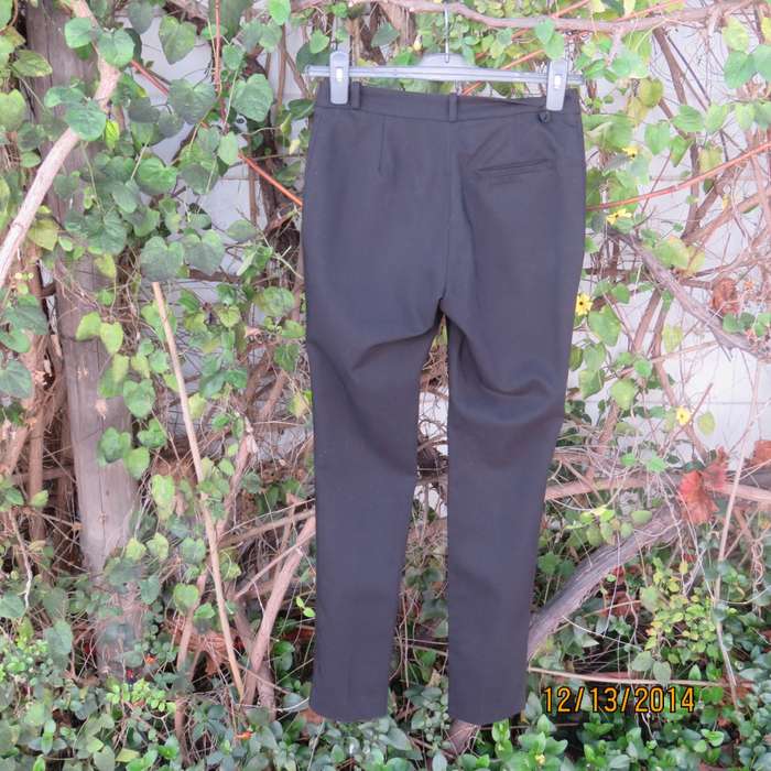 H&M very black skinny pants size 30. Three slash pockets. Stretch polycotton.