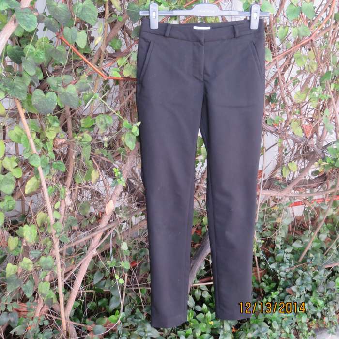 H&M very black skinny pants size 30. Three slash pockets. Stretch polycotton.